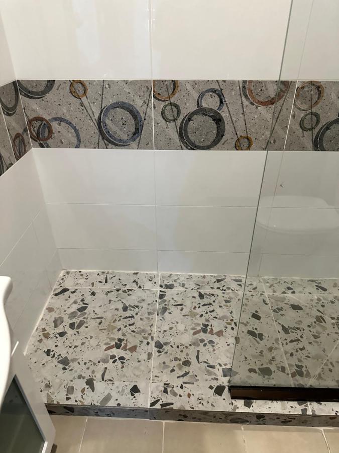 Ambitious Apartment Nadi Bagian luar foto